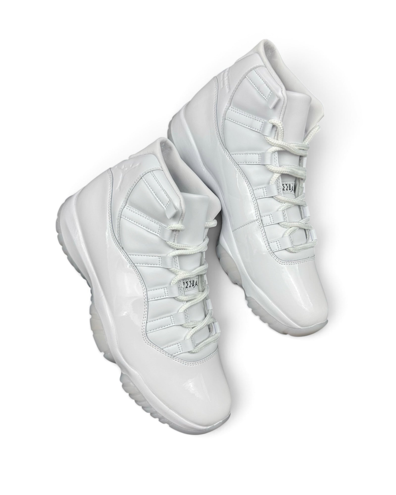 Air Jordan 11 High “Comme des Garçons Homme Plus” White