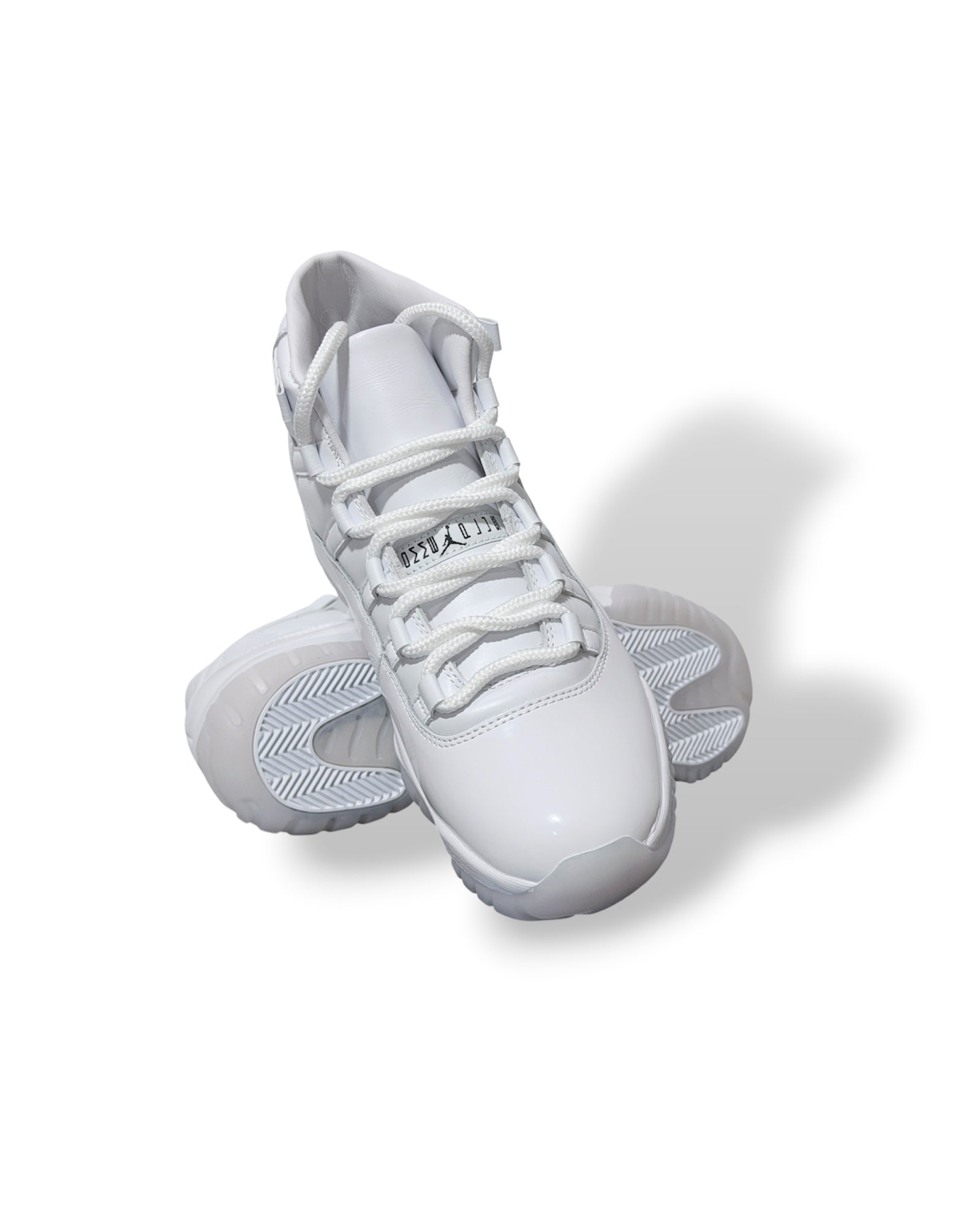 Air Jordan 11 High “Comme des Garçons” White