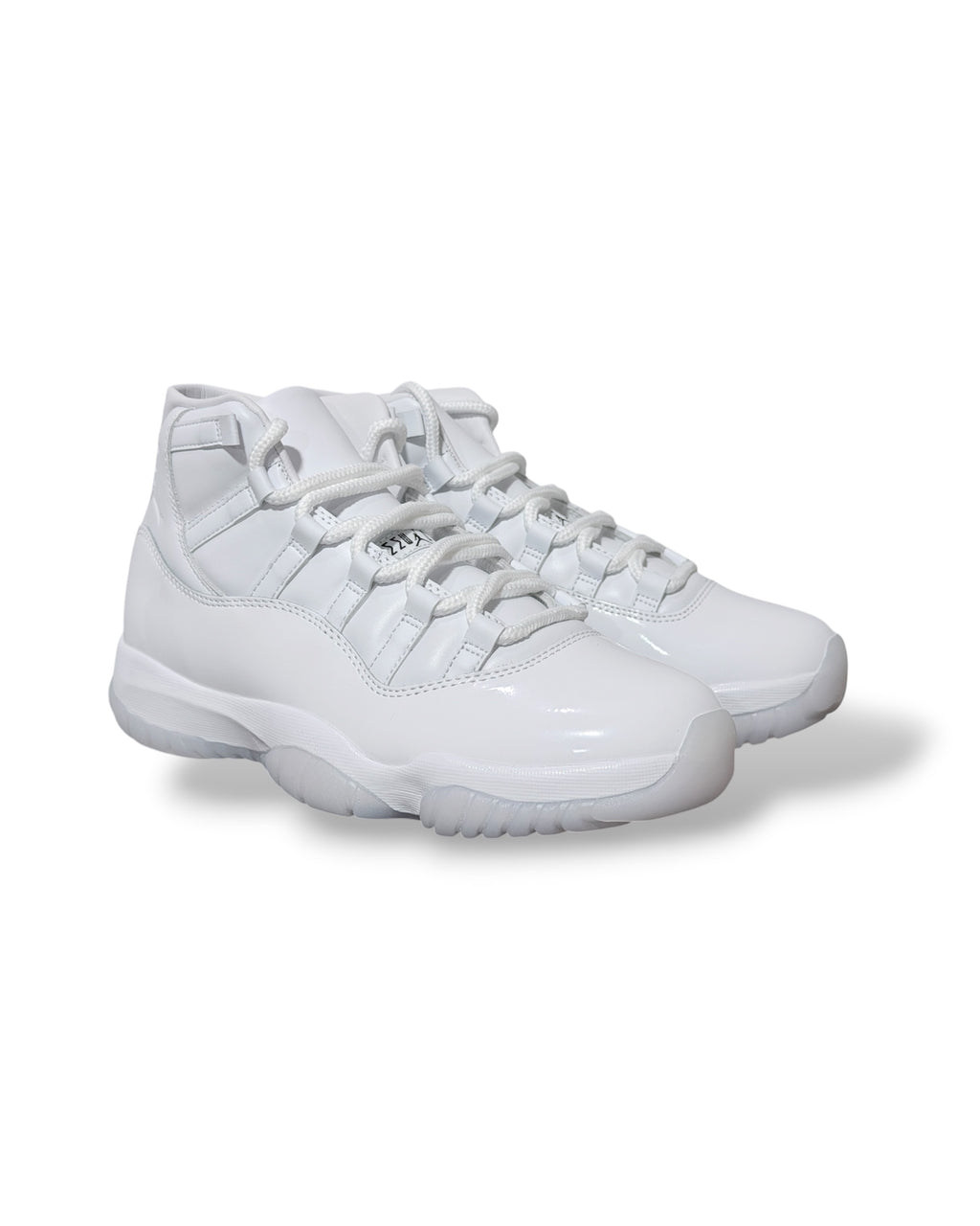Air Jordan 11 High “Comme des Garçons” White