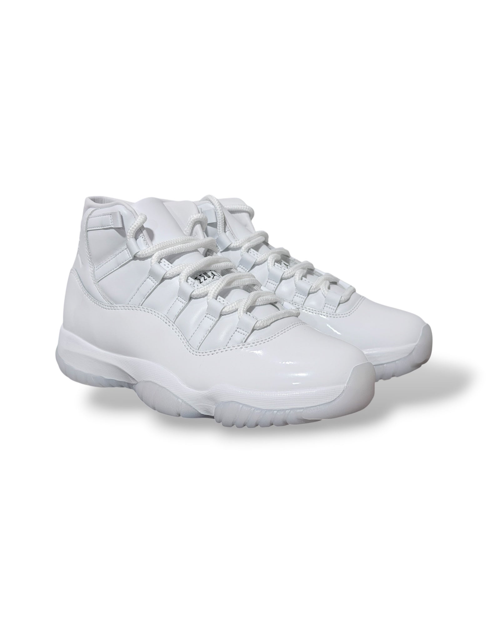 Air Jordan 11 High “Comme des Garçons” White
